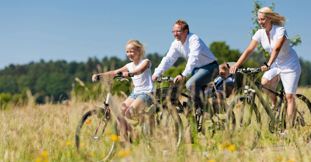 family biking in brittany