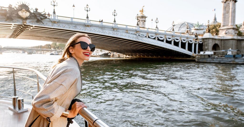 woman on a boat cruise in paris